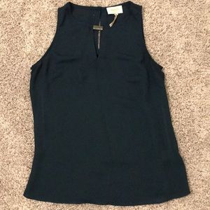 Dark green sleeveless top. XS